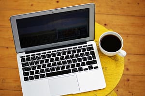 a laptop and a coffee