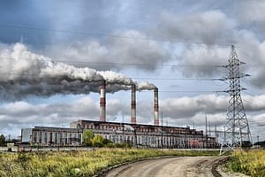 Factory and smoking chimneys